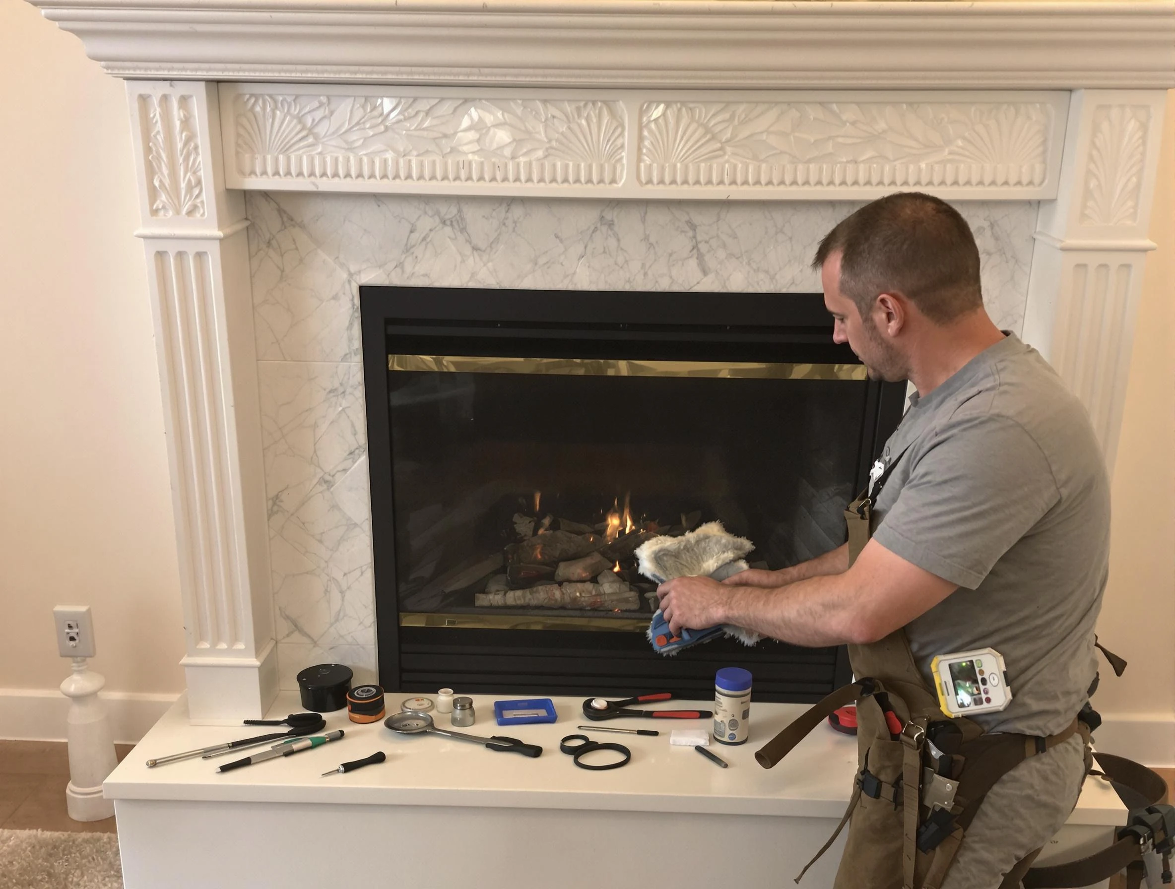 Highland Springs Chimney Sweep performing fireplace maintenance in Highland Springs, VA